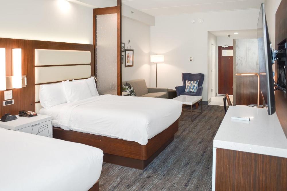 One-Bedroom Suite with Two Queen Beds and Sofa Bed interior